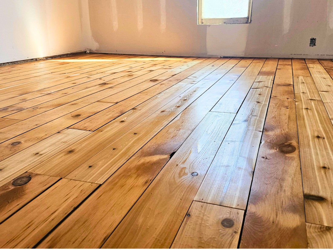 Freshly refinished pine wood floors. Finished natural with no stain and a water based finish in Elkhart Indiana.