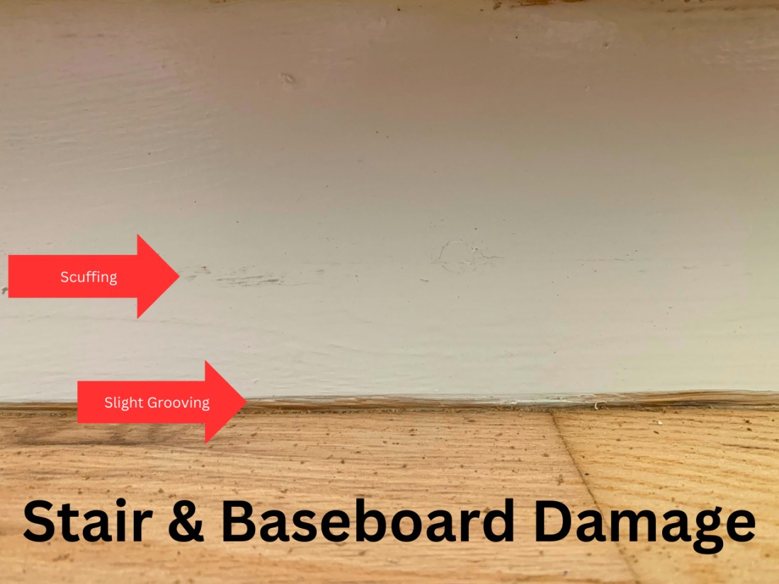 Damage to baseboards and stair risers from hardwood floor refinishing. Slight scuffing and grooving.